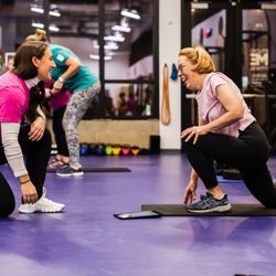 Studio ME Fitness - Coach and client warming up.
