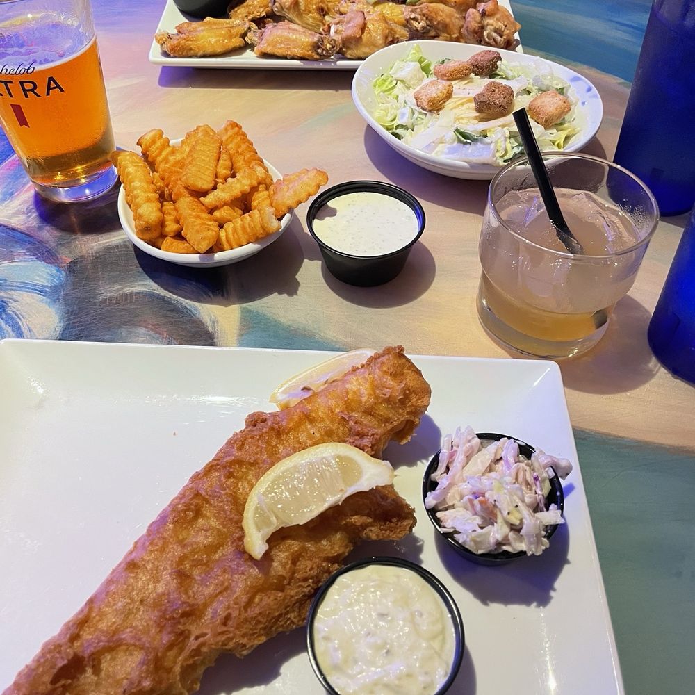 Coconuts On The Beach - Fish & Chips Chicken Wings Caesar Salad French Fries - Bars Near Me - Cocoa Beach, Florida Coconuts On The Beach - Fish & Chips Chicken Wings Caesar Salad French Fries - Bars Near Me - Cocoa Beach, Florida