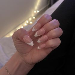 King Nails by Ann - Gel X after two weeks still looks amazing!! Still completely solid- not lifting. French tip, almond shape -long. Done by Ann