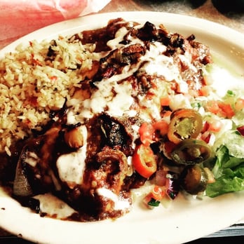 Chuy's - Fajita burrito with canalized onions! - Tex-Mex Near Me - Austin, Texas