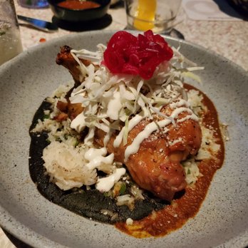 Coasterra - Chicken mole and pipian with a spicy red onion relish over rice. - Mexican Near Me - San Diego, California Coasterra - Chicken mole and pipian with a spicy red onion relish over rice. - Mexican Near Me - San Diego, California