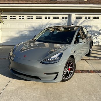 Dependable Guys - White Model 3 wrapped in nardo gray with red painted calipers, chrome delete, and red badges - Auto Customization Near Me - Santa Ana, California Dependable Guys - White Model 3 wrapped in nardo gray with red painted calipers, chrome delete, and red badges - Auto Customization Near Me - Santa Ana, California