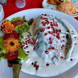 Viva Mexico - Their signature dish: "Chiles En Nogada" stuffed nutty beef with pomegranate cream sauce.