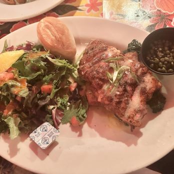 Louis Louis - Blackened grouper over spinach grit cake with lemon butter sauce and capers - House salad with tomato vinaigrette - New American Near Me - Santa Rosa Beach, Florida Louis Louis - Blackened grouper over spinach grit cake with lemon butter sauce and capers - House salad with tomato vinaigrette - New American Near Me - Santa Rosa Beach, Florida