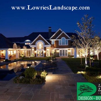 Lowrie's Landscape - a beautiful home at night - Landscaping Near Me - Village Of Clarkston, Michigan