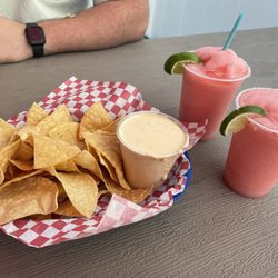 49th Street Bar And Grill - Chips and queso. 2 strawberry margaritas