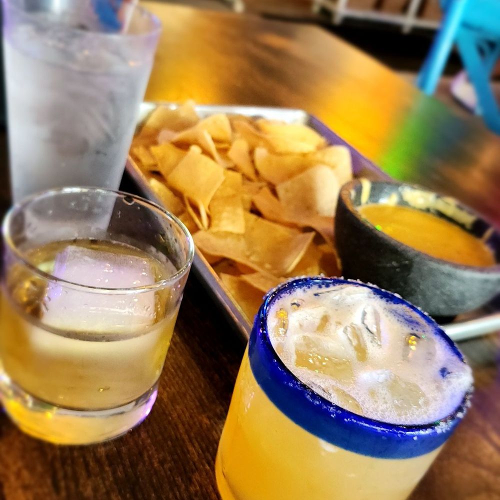 Circo - Tequila Old Fashioned and Bourbon Margarita. Pictured with chips and queso that you are definitely not getting for free. - Mexican Near Me - Sarasota, Florida Circo - Tequila Old Fashioned and Bourbon Margarita. Pictured with chips and queso that you are definitely not getting for free. - Mexican Near Me - Sarasota, Florida