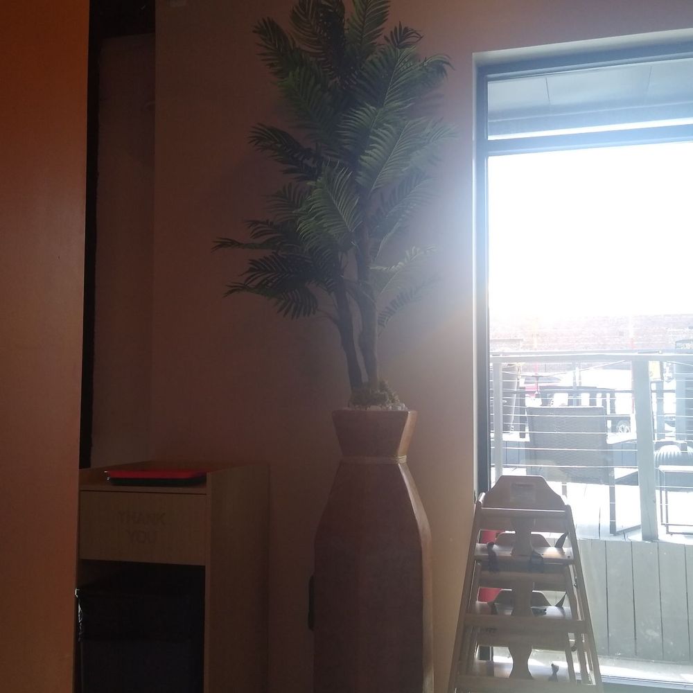 Buena Vida - Large pottery, trash can near exit. - Tacos Near Me - Fort Worth, Texas