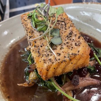 One Flew South - Salmon entree - served in a warmed plate - New American Near Me - Atlanta, Georgia One Flew South - Salmon entree - served in a warmed plate - New American Near Me - Atlanta, Georgia