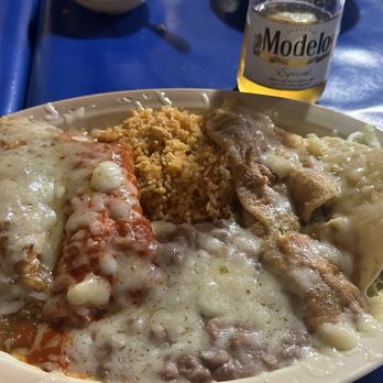 Chope's Bar and Café - Green chicken, enchilada, red beef, enchilada chili and a chicken taco with rice and beans - Mexican Near Me - La Mesa, New Mexico Chope's Bar and Café - Green chicken, enchilada, red beef, enchilada chili and a chicken taco with rice and beans - Mexican Near Me - La Mesa, New Mexico