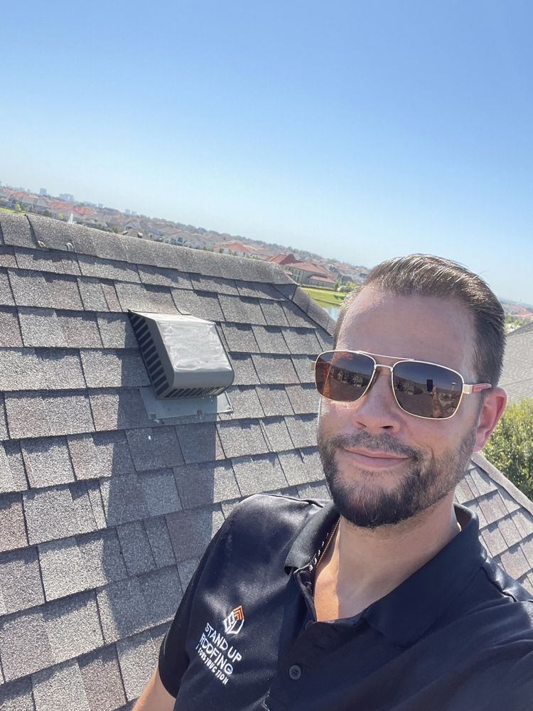 Slide of Stand Up Roofing & Construction