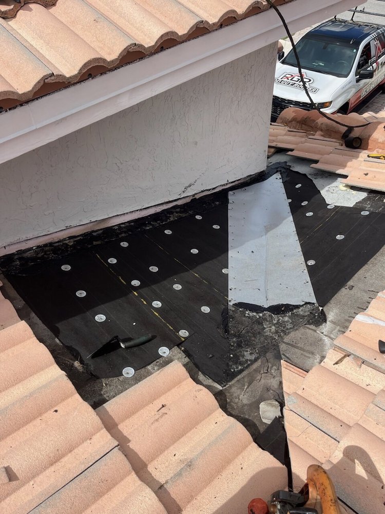 Slide of RGR Rod Guy Roofer