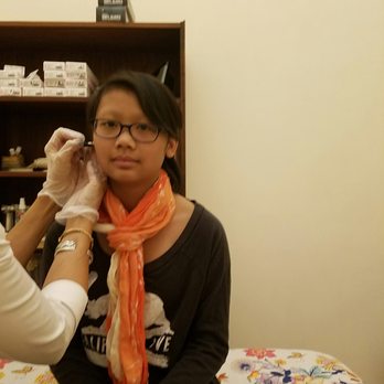 Clinical Ear Piercing - As her earlobes are being marked by Rachel @Clinical Ear Piercing - Piercing Near Me - New York, New York