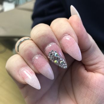 Poshe Nails & Spa - The patch job of the original broken pointer finger and Swarovski crystal redo on middle finger and overall shape of the nails - Nail Salons Near Me - Richardson, Texas