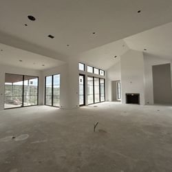 Castillo Drywall - Smooth white walls after priming.
