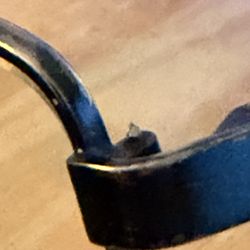 Monji Optometry - Left side showing protruding replacement screw