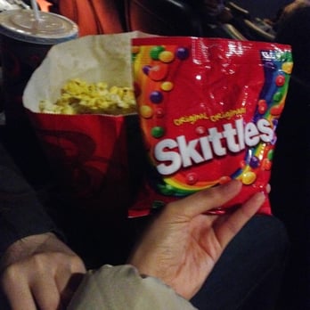 Cineplex Odeon - Concession snacks: popcorn and Skittles - Cinema Near Me - Toronto, Ontario