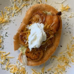 173 Surf & Turf - Shrimp taco bowl with cheese and sour cream.