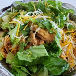 Baja bowl - grilled chicken, shredded cheese, lettuce, black beans, rice and tomatillo sauce Baja bowl - grilled chicken, shredded cheese, lettuce, black beans, rice and tomatillo sauce