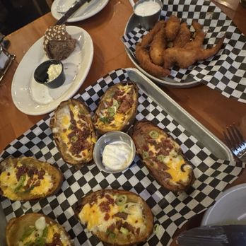 Black Angus Steakhouse - Loaded potato skin and buffalo chicken tenders. Don't miss out on these. - Steakhouses Near Me - San Lorenzo, California Black Angus Steakhouse - Loaded potato skin and buffalo chicken tenders. Don't miss out on these. - Steakhouses Near Me - San Lorenzo, California