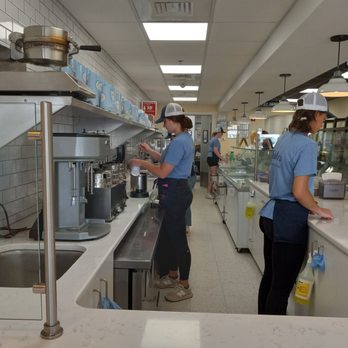 Berties Creative Creamery - two women working in a commercial kitchen - Ice Cream & Frozen Yogurt Near Me - Westwood, Massachusetts Berties Creative Creamery - two women working in a commercial kitchen - Ice Cream & Frozen Yogurt Near Me - Westwood, Massachusetts