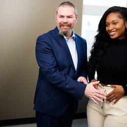 Plastic Surgery Center of Hampton Roads - A plastic surgeon doing a consultation with a patient at Plastic Surgery Center of Hampton Roads in Williamsburg.