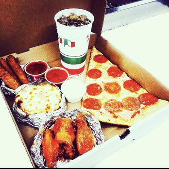 Pizza Casbah - THE LUNCH BOX SPECIAL: Giant slice with one topping, a 22oz drink, and your choice of side of side. It's the best deal! - Pizza Near Me - Fort Collins, Colorado Pizza Casbah - THE LUNCH BOX SPECIAL: Giant slice with one topping, a 22oz drink, and your choice of side of side. It's the best deal! - Pizza Near Me - Fort Collins, Colorado