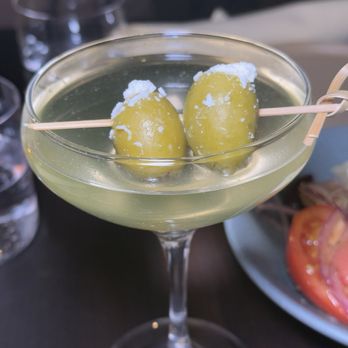Nerina - Martini with olive infused vodka and feta stuffed olives - Greek Near Me - Brooklyn, New York