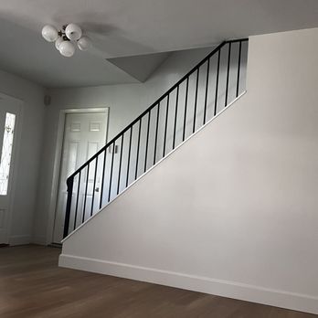 Elevate Metal - Got rid of old/dated ornate wood railing and replaced with powder coated metal! - Metal Fabricators Near Me