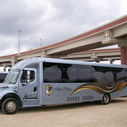 Star Shuttle & Charter - Side view of luxury charter vehicle from Abbey Walker executive cars and limousine division of Star Shuttle. 800-341-6000