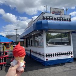 Small Vanilla Cone with cherry hard dip