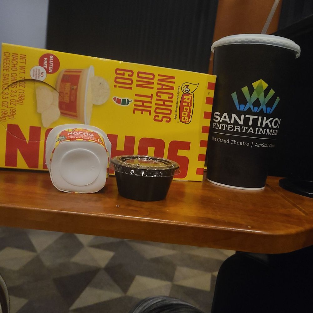 Santikos Palladium - Nachos with extra cheese cup, jalapeños, and a soda - Cinema Near Me - San Antonio, Texas Santikos Palladium - Nachos with extra cheese cup, jalapeños, and a soda - Cinema Near Me - San Antonio, Texas
