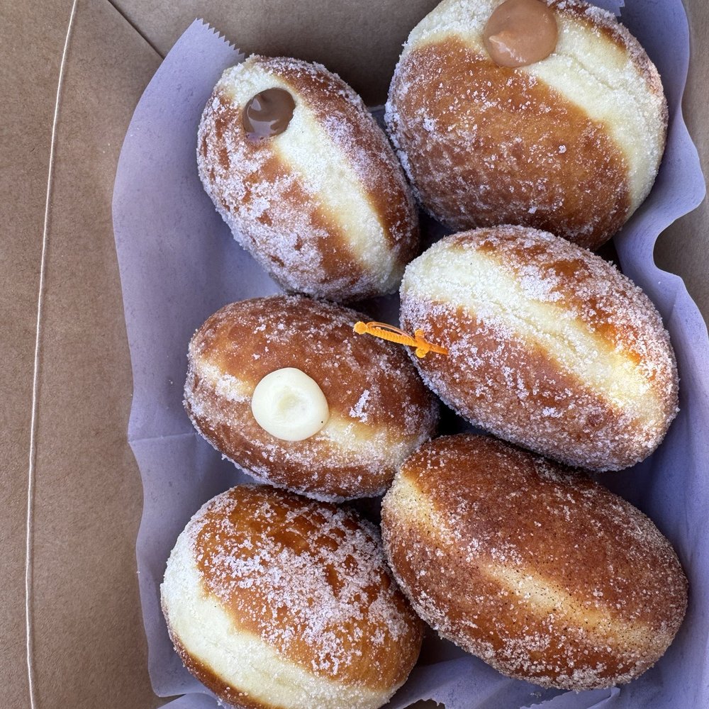 Filled Malasadas (chocolate sea salt honey, guava, vanilla bean) Sugared Malasadas (Lemon Sugar, sugar, Cinnamon Sugar) Filled Malasadas (chocolate sea salt honey, guava, vanilla bean) Sugared Malasadas (Lemon Sugar, sugar, Cinnamon Sugar)