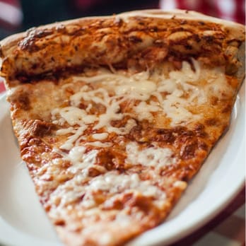 Pizza D'Oro - The BIGGEST slice of pizza ever.  I believe it was 6"x13". It was called the Giant slice. - Pizza Near Me - Costa Mesa, California