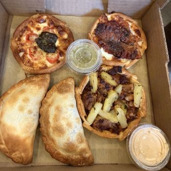Vinoma - Clockwise from upper left: Caprese, Plum & Bacon, Al Pastor (before sauce), Traditional Beef, Steak & Cheese - Empanadas Near Me - Rohnert Park, California Vinoma - Clockwise from upper left: Caprese, Plum & Bacon, Al Pastor (before sauce), Traditional Beef, Steak & Cheese - Empanadas Near Me - Rohnert Park, California