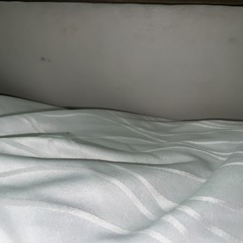 Aspire Inn and Suites - Black stains at foot of bed - Hotels Near Me - Orange, California Aspire Inn and Suites - Black stains at foot of bed - Hotels Near Me - Orange, California