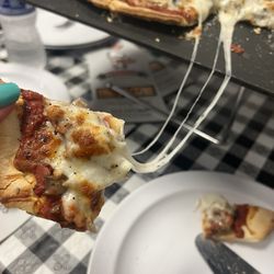 Alfanos Pizza Eatery - Look at the cheese pull!!!