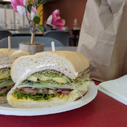 Veggie sandwich with smoked turkey and cantaloupe agua fresca