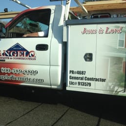 a truck parked in front of a building