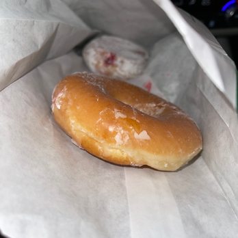 Krispy Kreme - Hiding on the bottom...strawberry jam fill. I'm a fan! - Coffee & Tea Near Me - Seattle, Washington
