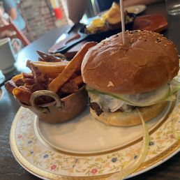 Burger with fries on the side...