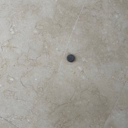 Scratch on the marble floor Scratch on the marble floor
