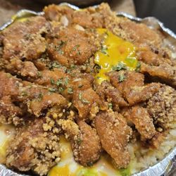 Cafe 48 - Boneless chicken over fried rice with Portuguese sauce