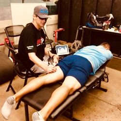 Corey Lichtman, D.C. Solana Beach Family & Sports Chiropractic - Lightforce deep laser therapy being used with the San Diego Sockers