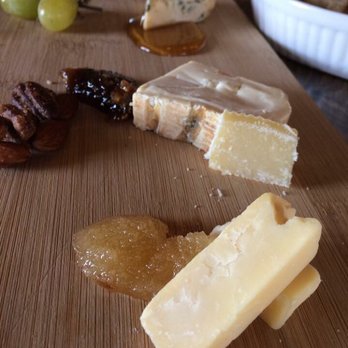 The Table & Vine - Delicious cheese board, paired nicely with various nuts and honeys - Caterers Near Me