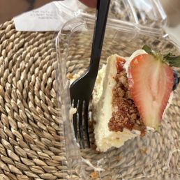 The size of the cheese cake compared to the end of the fork is how tiny it was ... The size of the cheese cake compared to the end of the fork is how tiny it was ...