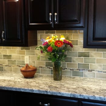 Lacorte's Tile - a vase of flowers on a kitchen counter - General Contractors Near Me - San Jose, California