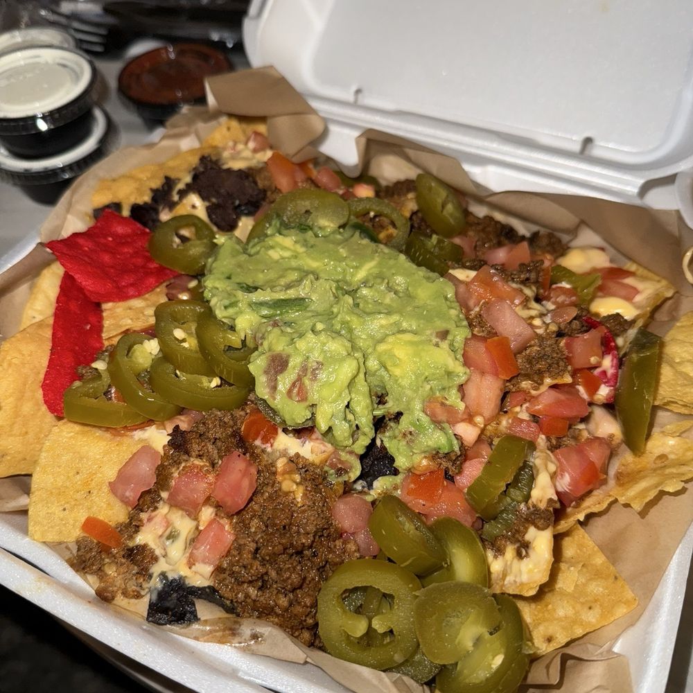 Clock Tower Grill - Nachos - Sports Bars Near Me - Lone Tree, Colorado Clock Tower Grill - Nachos - Sports Bars Near Me - Lone Tree, Colorado