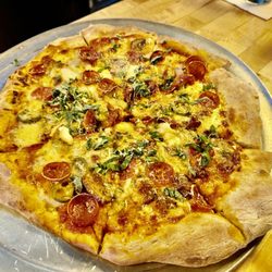 Tipsy Tavern - Pizza night - Thursdays! Buy a bottle of wine, get a free pizza. Amazing deal!