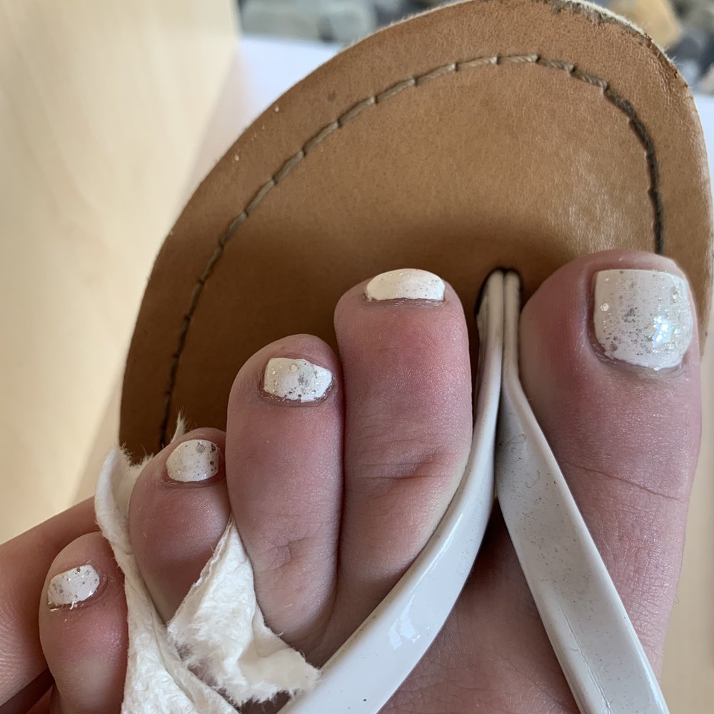 uneven cutting of nails. lack of sparkles. lack of things in between the toes.